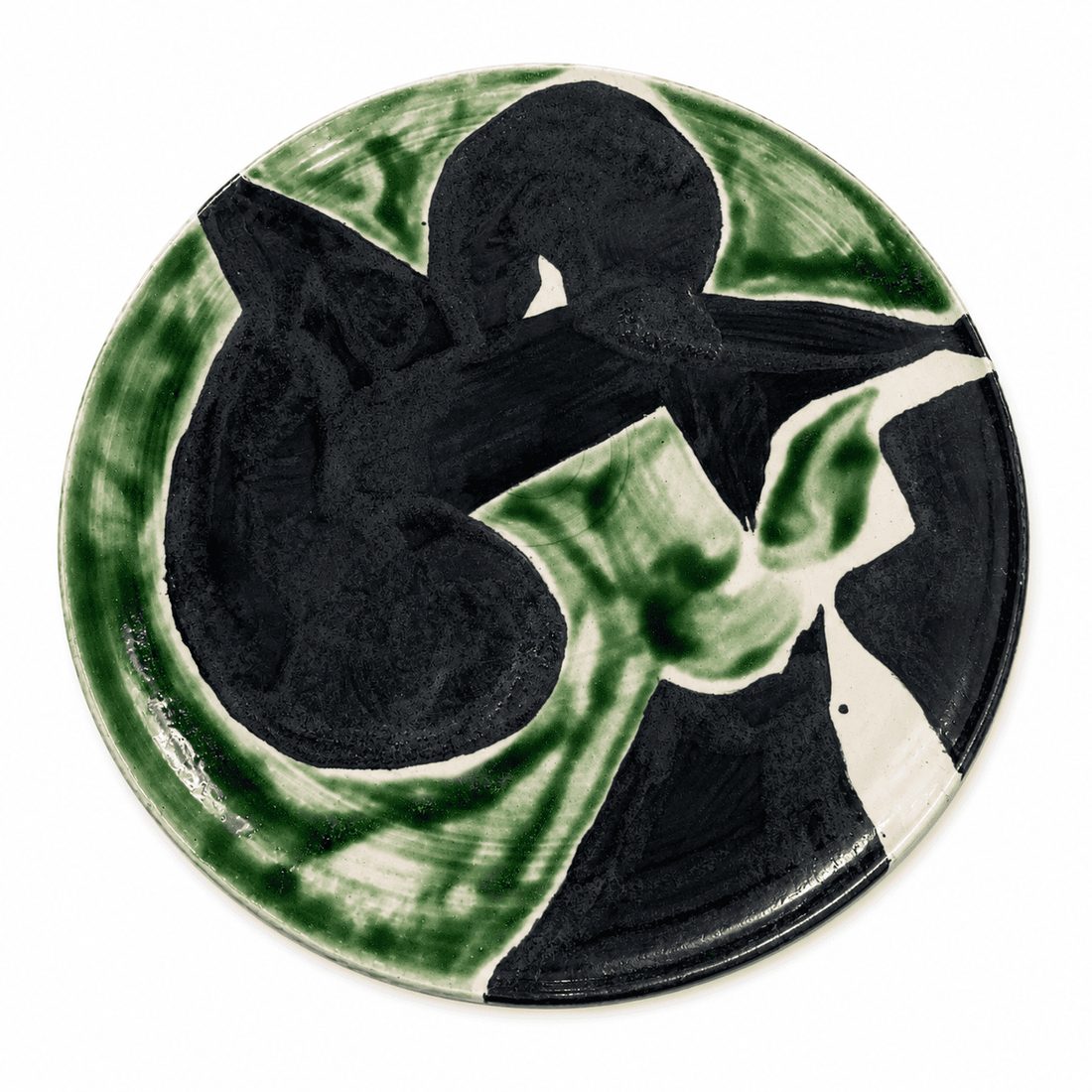 Assiette, forme noire sur fond vert